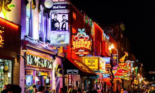 Neon signs on buildings in Downtown Nashville.